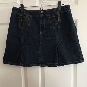 Dark wash box pleated jean skirt w/brass details